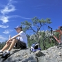 Boy sitting on a rock after biking in Custer State Park